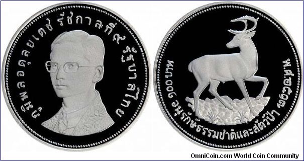 Brown-Antlered Deer on Reverse of 2517 / 1974 Thai 100 Baht silver proof crown. Issued in conjuction with the WWF and IUCNNR (World Wildlife Fund, and the International Union for Conservation of Nature and Natural Resources).