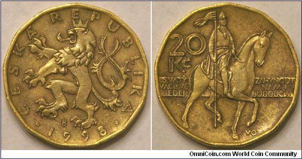 20 korun, featuring the St. Wenceslas monument, 26 mm, lightly faceted 13 sides, brass plated steel. (ref. http://en.wikipedia.org/wiki/Coins_of_the_Czech_koruna)