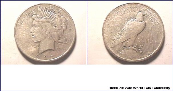 US 1922 PEACE SILVER DOLLAR. 0.900 silver. Die crack under Peace on rim.