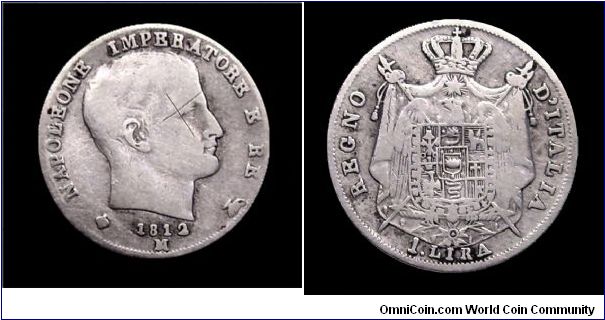 Napoleonic Kingdom of Italy.
1 Lira - MIlan mint. Silver.
Someone put his anti-napoleonic signature