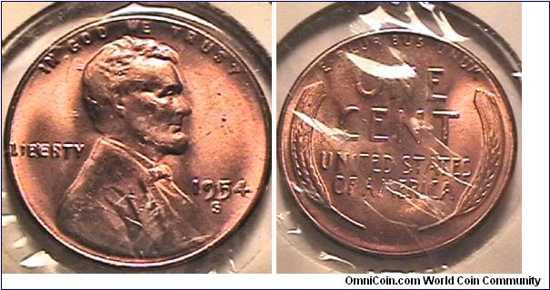 US 1954-S, LINCOLN CENT. ERROR COIN EXTRA METAL BETWEEN B&E IN LIBERTY.