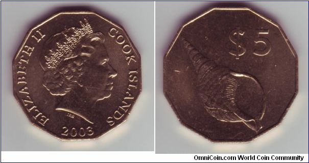 Cook Islands - $5 - 2003

Same size as the Australian 50c although in a brass finish rather than silver finish.  This has a seashell of sorts on the reverse