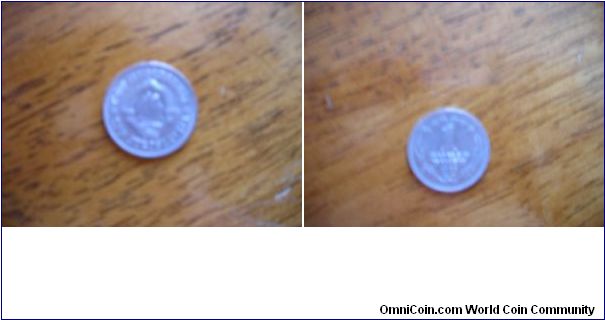 1 Dinar coin
Very poor quality photos sorry