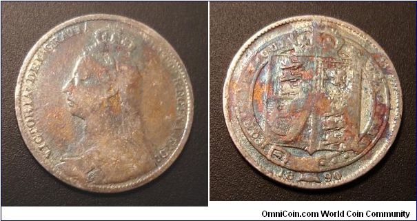 I think this is a 1 shilling, but I am not sure, it's about the size of a US quarter, little smaller. Cleaned and retoned, odd colors.