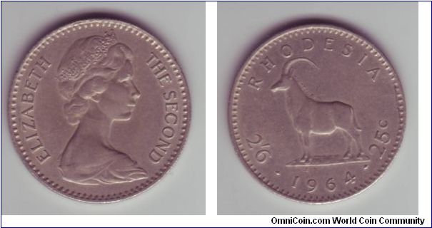 Rhodesia - Half Crown/25c coin - 1964

Rather odd coin in the sense that it has a dual currency on it.  To the left 2/-6 or Half Crown & to the right 25c.

This coin was obviously minted with decimalisation in mind, atlhough it wouldn't have survived long, Rhodesia declared unofficial independance not long after