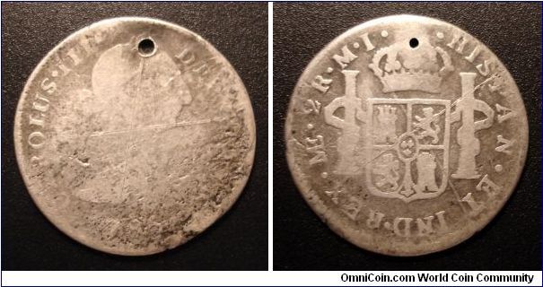 1786 2 reale, minted in Lima Peru under Spain. Holed and grafiti, which to me means it was actually used, and that means it was a part of history moreso than any higher grade coin...except maybe the ultra-rares, lol. Ala 1787 Brasher Doubloons, The 1804 dollars, 1913 Libery Nickels, 1933 Double eagles.