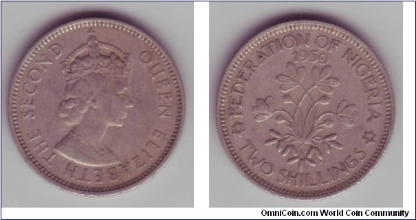 Nigeria - 2/- - 1959

Circulated, but overall nice design, this coin is part of a theme on the nigerian coins under British Empire rule, with floral designs on the 3p, 1/- & 2/- at least.