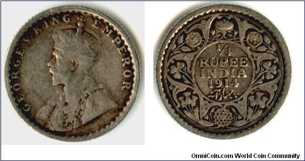 A Quarter Rupee from India. On the reverse Shamrock, Thistle, Rose and Lotus. Calcutta mint.