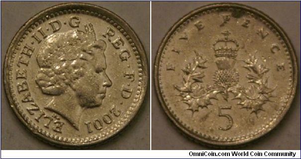 5 pence, 18 mm (reduced size from pre 1990 version), Cu-Ni?  Roughly same size and value as U.S. dime.