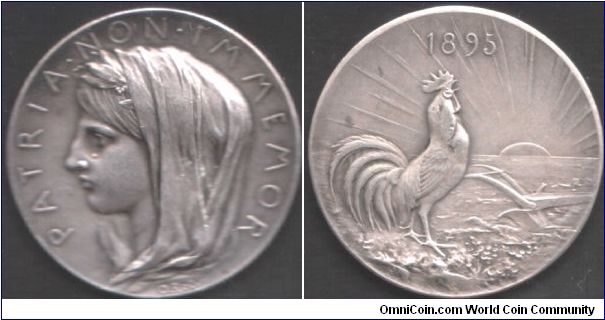 A beautiful silver medal  by Oscar Roty commemorating the 25th anniversary of the 3rd republic. Obverse legend `the country does not forget' the defeat at Sedan in 1870 symbolised by a tear. The reverse design has elements of the silver coinage of France also engraved by Oscar Roty and minted during the period 1895 -1920.