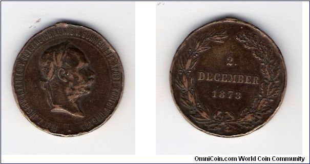 I THINK IT IS A WAR MEDAL WITH FRANZ JOSEPH ON THE OBVERSE
 DECEMBER 2 1873


LINK BELOW
http://www.austro-hungarian-army.co.uk/engage.htm