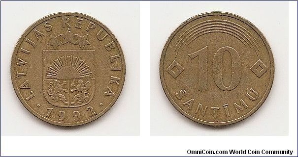 10 Santimu
KM#17
Brass, 20 mm. Obv: National arms Rev: Lined arch above value
flanked by diamonds