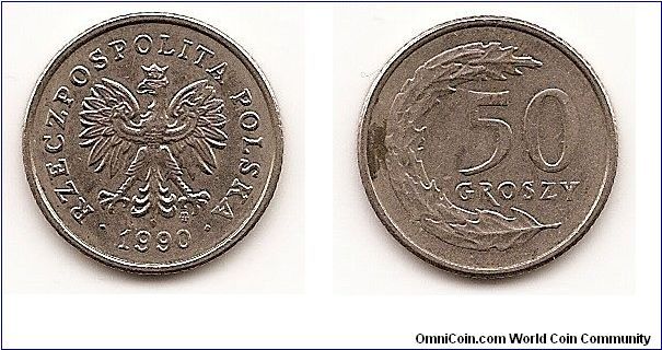 50 Groszy
Y#281
3.9400 g., Copper-Nickel, 20.5 mm. Obv: National arms Obv.
Leg.: RZECZPOSPOLITA POLSKA Rev: Value to right of sprig
Edge: Reeded