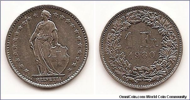 1 Franc
KM#24a.1
4.4000 g., Copper-Nickel, 23.1 mm. Obv: Standing Helvetia with
lance and shield within star border Rev: Value within wreath Edge:
Reeded