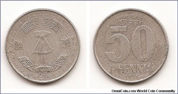 50 Pfennig Demokratic Republic
KM#12.2
1.9000 g., Aluminum, 23 mm. Obv: State emblem Rev:
Denomination divides date and leaf Note: Inscription varieties exist.