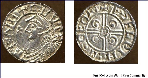 Obv:- CNVT R-EX ANG, Helmeted bust left holding sceptre
Rev:- AEDELRINE MO EOR, Short cross voided, limbs united at base by two circles, in centre a pellet; in each angle a broken annulet enclosing a pellet
Minted in York (EOR) by moneyer Aethelwine (AEDELRINE) A.D. 1024-1030
Reference:- North 787