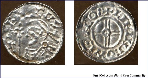 Obv:- CNVT REX, Diademed bust left holding sceptre
Rev:- LIFINC ON LINCO, Short cross voided; in centre, a circle enclosing a pellet
Minted in Lincoln (LINCO by moneyer Lifinc (LIFINC) A.D. 1029-1035/6
Reference:- North 790