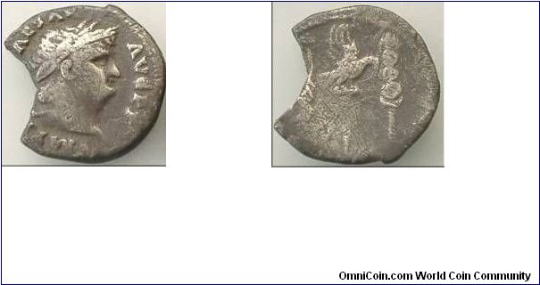 Nero Denarius (68 CE) Struck in Nero's final year as Emperor. The coin has been defaced in antiquity to remove Nero's name. Rev. Eagle between standards.

(Ex. Guy de la Bedoyere)