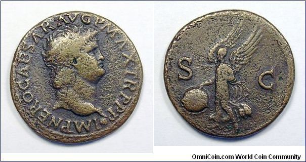 NERO As. Lugdunum Mint. IMP NERO CAESAR AVG P MAX TR P PP, head right / S-C on either side of Victory flying left with shield inscribed SPQR.