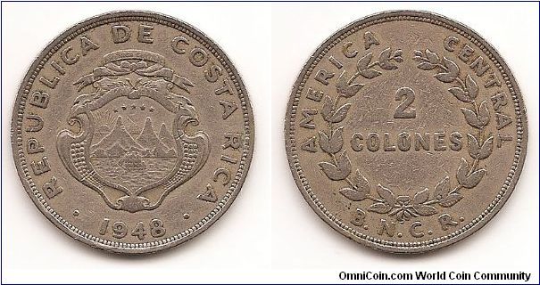2 Colones
KM#183
Copper-Nickel, 32 mm. Obv: National arms, date below Rev:
Denomination within wreath, B.N.C.R. below, -BNCR- (repeated)