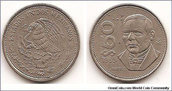 50 Pesos
KM#495
Copper-Nickel, 23.5 mm. Subject: Benito Juarez Obv: National
arms, eagle left Rev: Bust 1/4 left with diagonal value at left Edge:
Reeded