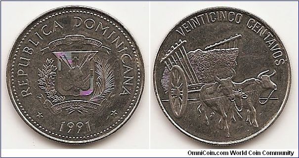 25 Centavos
KM#71.1
Nickel Clad Steel, 24mm. Subject: Native Culture Obv: National
arms, date below Rev: Two oxen pulling cart, denomination above