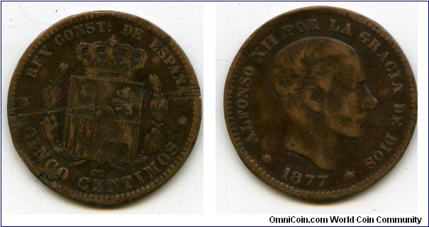 1877Om
5 Centimos
Coat of Arms & Alfonso XII 1886-1931
Minted by Oeschger Mesdach & Co