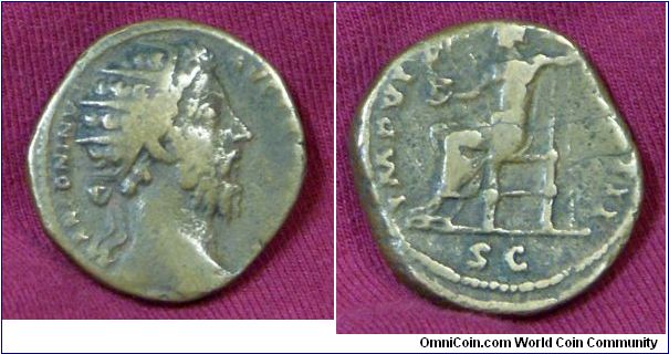 Marcus Aurelius Dupondius, Dec. 173-June 174 AD, Rome.
Obv: M ANTONINVS AVG TR P XXVIII, radiate head right.
Rev: IMP VI COS III - S C, Jupiter seated left, holding Victory and sceptre.
RIC 1100, Cohen 251