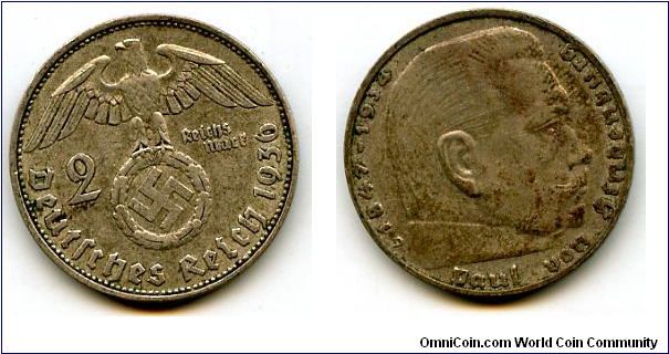 1936D 
2 Marks
German Eagle cluthing Swastika
Paul Von Hindenburg
Mint Mrk D = Munich