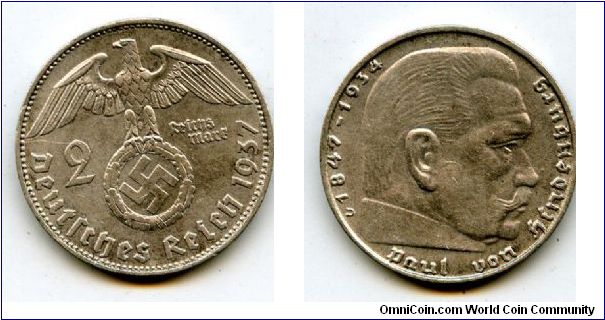 1937D 
2 Marks
German Eagle cluthing Swastika
Paul Von Hindenburg
Mint Mrk D = Munich