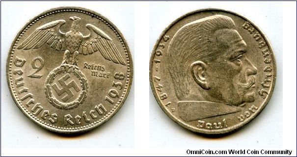 1938B 
2 Marks
German Eagle cluthing Swastika
Paul Von Hindenburg
Mint Mrk B = Vienna