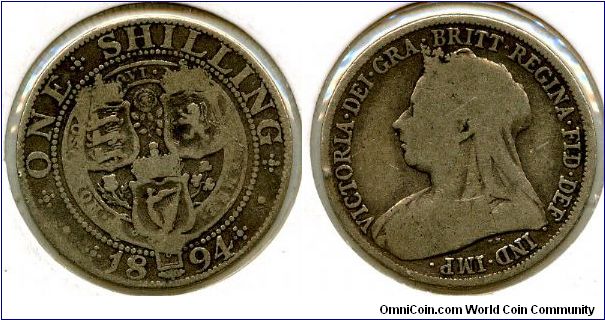1894
Old head
1/- Shilling
Three shield within Garter
Victoria 1837-1901