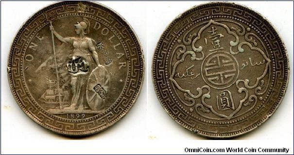 1899
$1 Trade Dollar Chop Marks 
Britannia standing on the shoreline holding Shield & trident, ship in background
Arabesque design with the Chinese symbol for longevity in the center. Value in two languages, Chinese & Malay
Mint Mrk B = Bombay