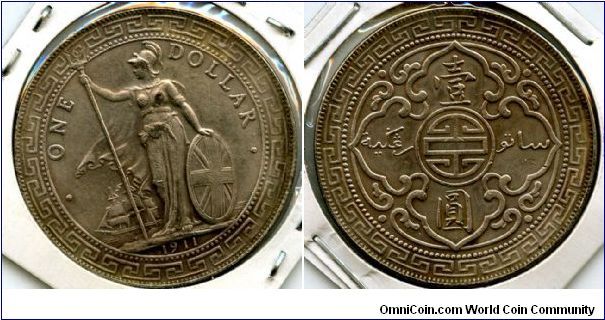 1911
$1 Trade Dollar
Britannia standing on the shoreline holding Shield & trident, ship in background
Arabesque design with the Chinese symbol for longevity in the center. Value in two languages, Chinese & Malay
Mint Mrk B = Bombay