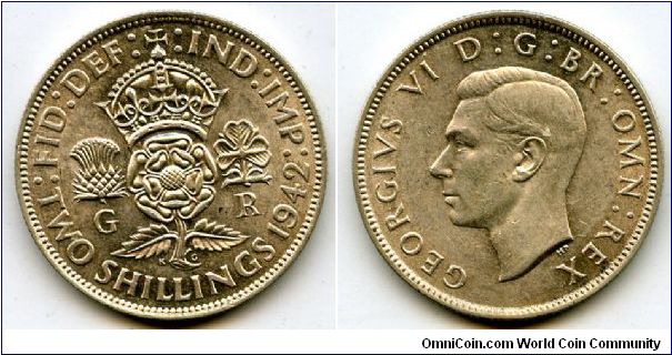 1942
2/-  Two Shillings
Crowned Rose, flanked by a Thistle & a Shamrock
King George VI
