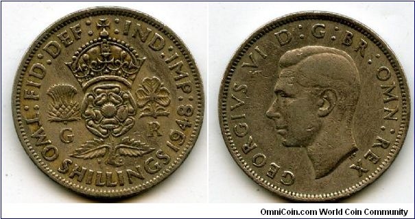 1948
2/-  Two Shillings
Crowned Rose, flanked by a Thistle & a Shamrock
King George VI