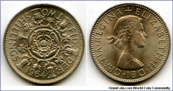1964
2/-  Two Shillings
Double Rose, surounded by Thistle's, Shamrock's & Leeks
Queen Elizabeth II