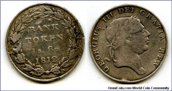 1812
1/6 One shilling & six pence Token
Bank of England Issue
Value in  oak wreath
George III Laureated Head