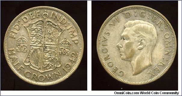 1942
2/6 Half Crown 
Shield flanked by crowns
King George VI