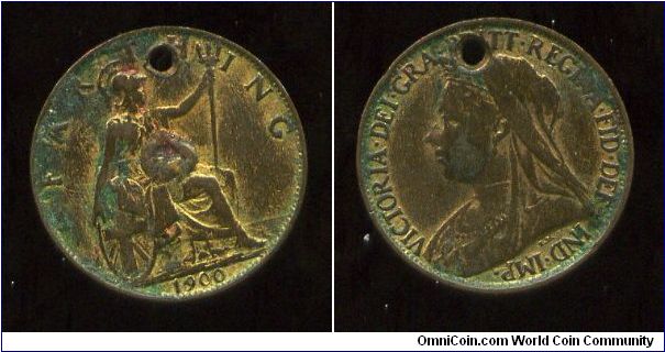 1900
1/4d Farthing 
Holed & gilded
Seated Britannia 
Queen Victoria
Possibly used as a love token