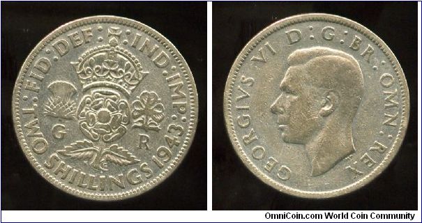1943
2/-  Florin
2/- Two Shillings
Crowned Rose, flanked by a Thistle & a Shamrock
King George VI