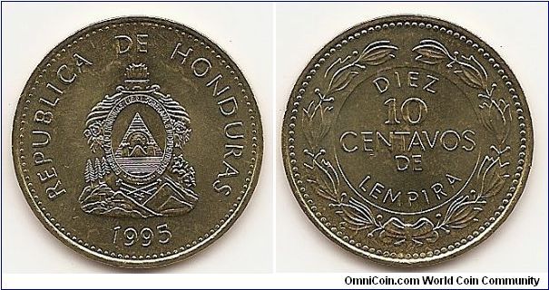 10 Centavos
KM#76.3
5.9700 g., Brass, 26 mm. Obv: National arms, with clouds behind
pyramid Rev: Denomination within circle, wreath surrounds