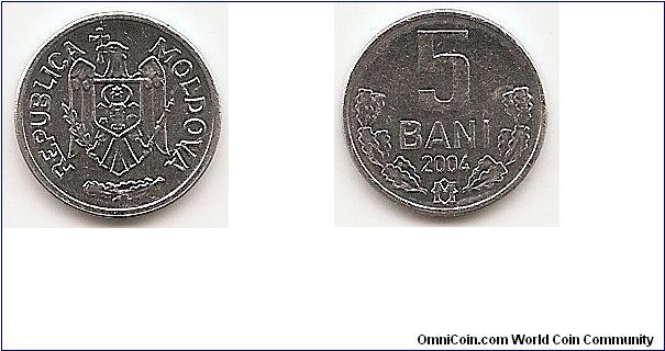 5 Bani
KM#2
0.8000 g., Aluminum, 16 mm. Obv: National arms Rev:
Monogram divides sprigs below value and date Edge: Plain