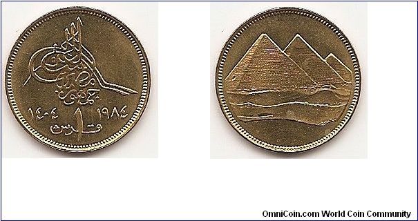 1 Piastre  
KM#553.2
Aluminum-Bronze, 18 mm. Obv: Islamic date left of
denomination, tughra above Rev: Pyramids