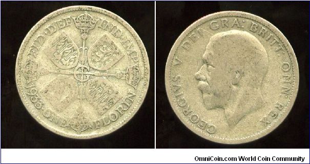 1933
2/- Florin
Florin
Cruciform shilds, Star in the centre, Scepters between shields
King George V
