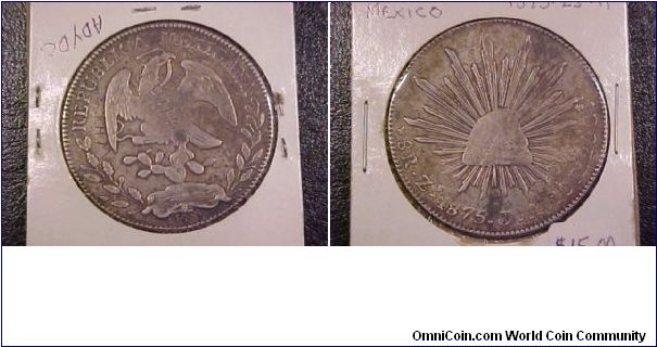 1875 Zs 9-reales with some graffiti on the obverse.