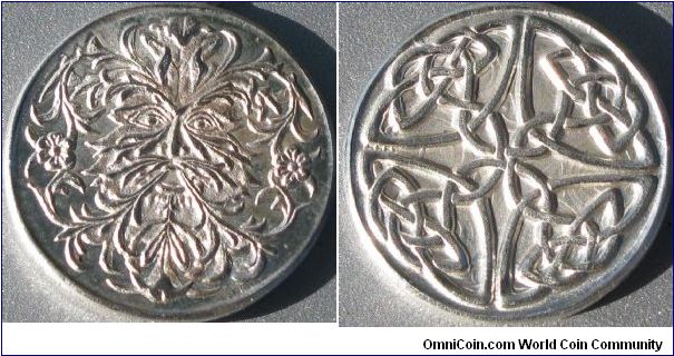 Drop hammer minted at the Texas Renfest 2007 greenman on obverse Celtic knot on reverse. Die clashed reverse