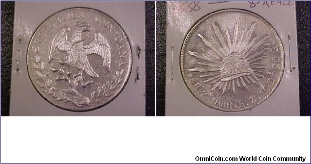 1888 Zs 8-reales, looks to have been cleaned.