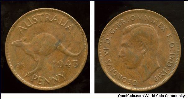 1943
1d
Kangaroo, value & date
King George VI,  
Kings head is showing under the Roo with no sign of indents!
Have been told this is a strike through, & quite common :-)