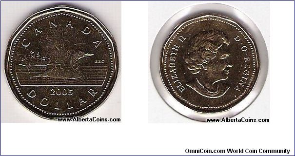 1 dollar canada AU-50 1.25
